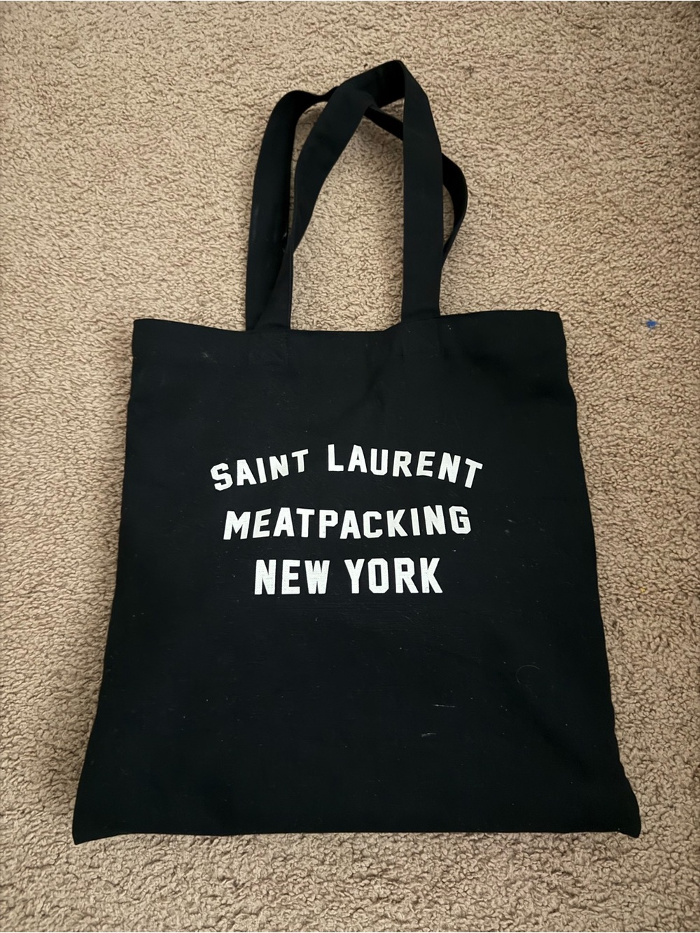 Saint Laurent Black Canvas Meatpacking Tote with White Lettering